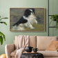 Natural wood floater framed canvas featuring an animal portrait of a dog in natural outdoor setting with soft light, displayed above a sofa in a modern living room.