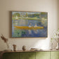 Natural wood floater framed canvas of The Skiff (La Yole), 1875 by Pierre-Auguste Renoir, featuring an impressionist boating scene with people relaxing in a narrow skiff above a sideboard in a softly lit hallway.