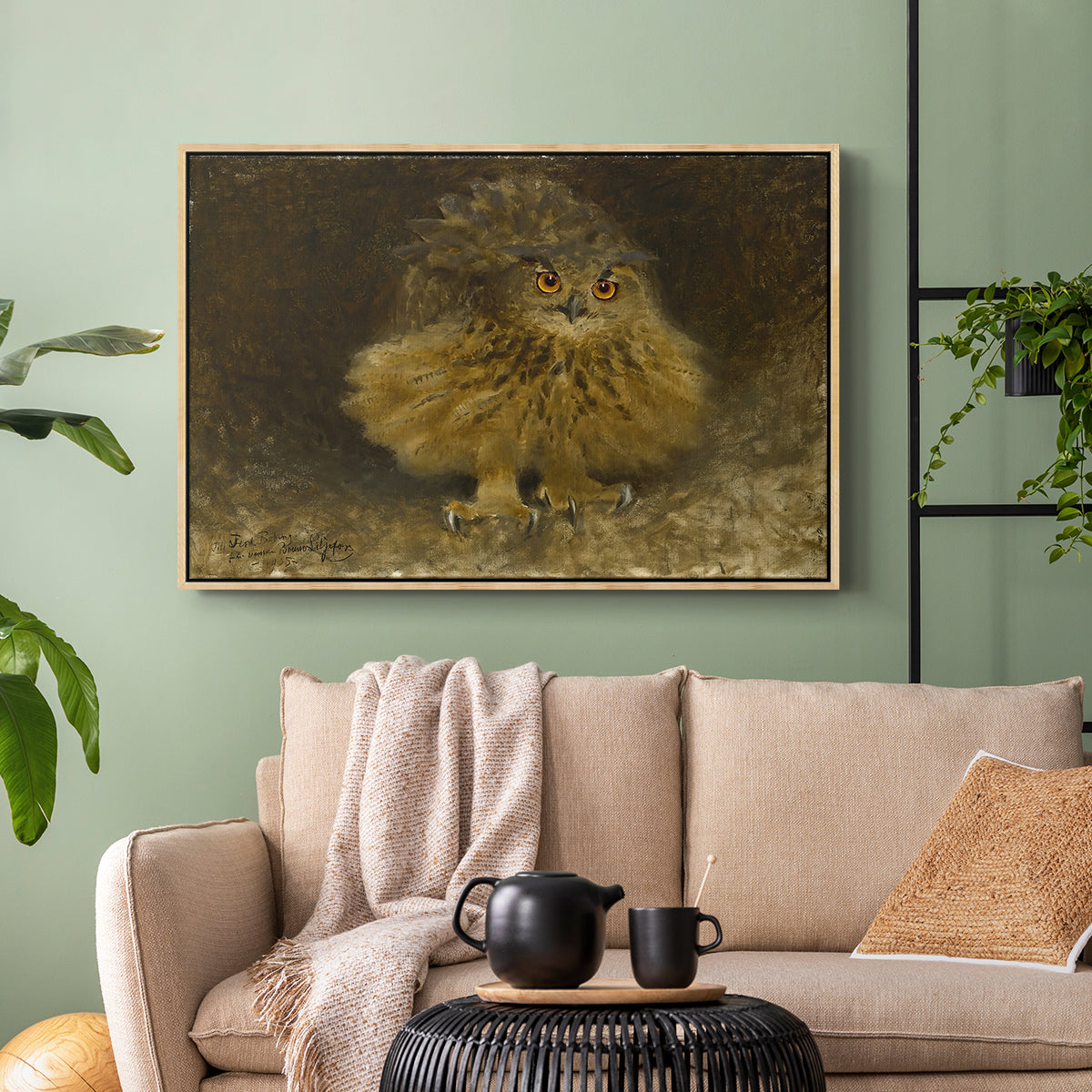 Natural wood floater framed canvas featuring a realistic depiction of owl camouflaged within woodland environment, displayed above a sofa in a modern living room.