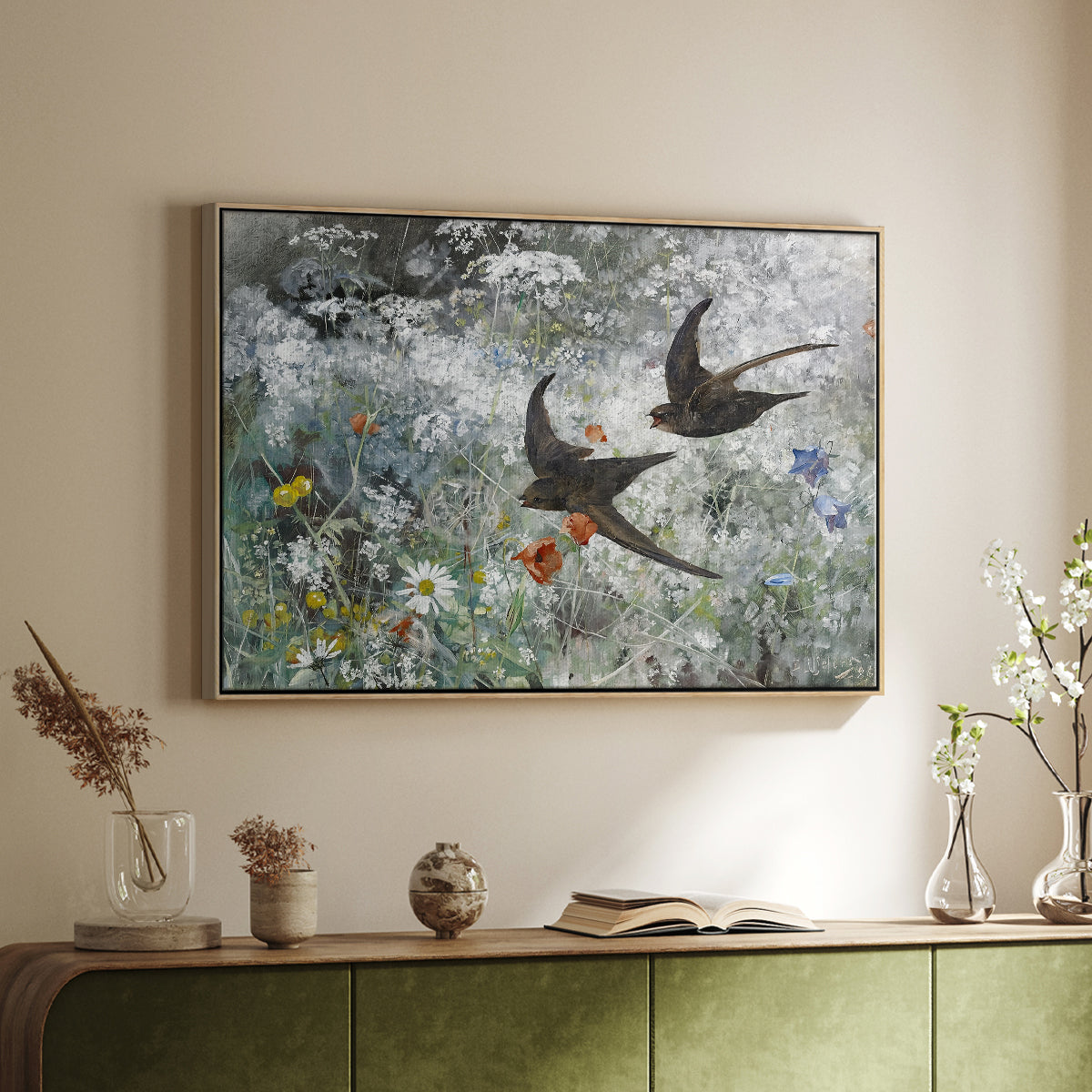 Natural wood floater framed canvas of Common Swifts, 1886 by Bruno Liljefors, featuring swifts gliding midair with wings spread against soft sky above a sideboard in a softly lit hallway.