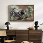 Hooded Crows (Kråkor), 1891 by Bruno Liljefors displayed in a natural wood floater framed canvas above a dark wood credenza in an entryway.