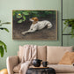 Natural wood floater framed canvas featuring a calm scene of dog reclining in open landscape, displayed above a sofa in a modern living room.