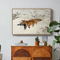 Fox in Snow Landscape, 1900 by Bruno Liljefors in a natural wood floater framed canvas featuring a fox running across snowy landscape with sparse vegetation, displayed above a wood console cabinet.