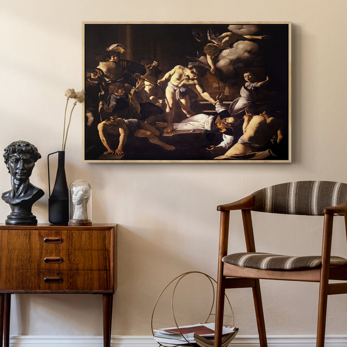 The Martyrdom of Saint Matthew, 1599-1600 by Caravaggio as a natural wood floater framed canvas featuring a religious narrative showing violent attack on saint in crowded setting, styled above a mid-century console in a contemporary living area.