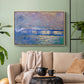 Natural wood floater framed canvas featuring a city bridge scene softened by mist and impressionist brushwork, displayed above a sofa in a modern living room.