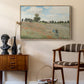 The Poppy Field near Argenteuil, 1873 by Claude Monet as a natural wood floater framed canvas featuring a bright meadow filled with poppies under open sky, styled above a mid-century console in a contemporary living area.
