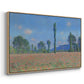 Angled view of Poppy Field (Giverny), 1890-1891 by Claude Monet in a natural wood floater framed canvas.