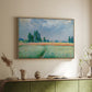 Natural wood floater framed canvas of The Wheat Field (Champ de Blé), 1881 by Claude Monet, featuring an impressionist depiction of ripened grain field in countryside above a sideboard in a softly lit hallway.