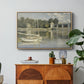 The Bridge at Argenteuil, 1874 by Claude Monet in a natural wood floater framed canvas featuring a bridge spanning river with sailboats and reflections in water, displayed above a wood console cabinet.
