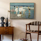 A Holiday, c. 1915 by Edward Henry Potthast as a natural wood floater framed canvas featuring an impressionist coastal view of families enjoying seaside water, styled above a mid-century console in a contemporary living area.