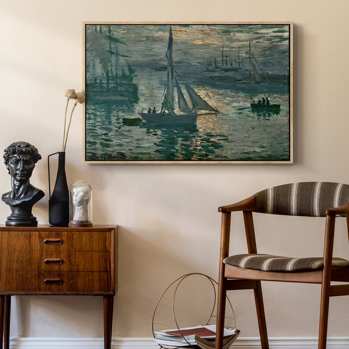 Sunrise (Marine), 1873 by Claude Monet as a natural wood floater framed canvas featuring an early morning harbor scene with boats and diffused light, styled above a mid-century console in a contemporary living area.