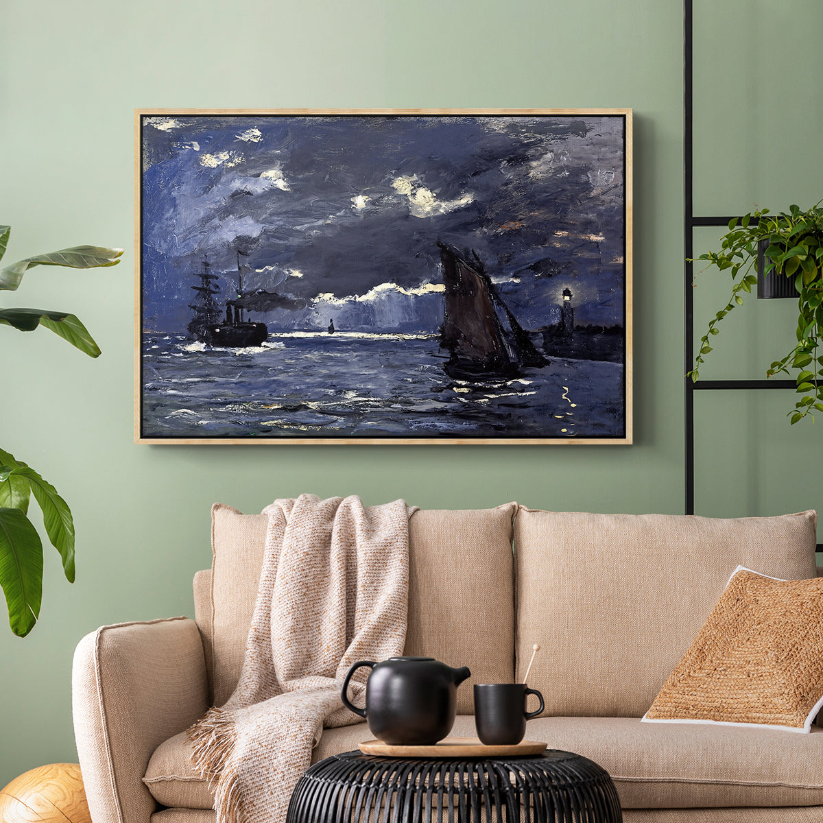 Natural wood floater framed canvas featuring an atmospheric maritime view with ships in moonlit darkness, displayed above a sofa in a modern living room.