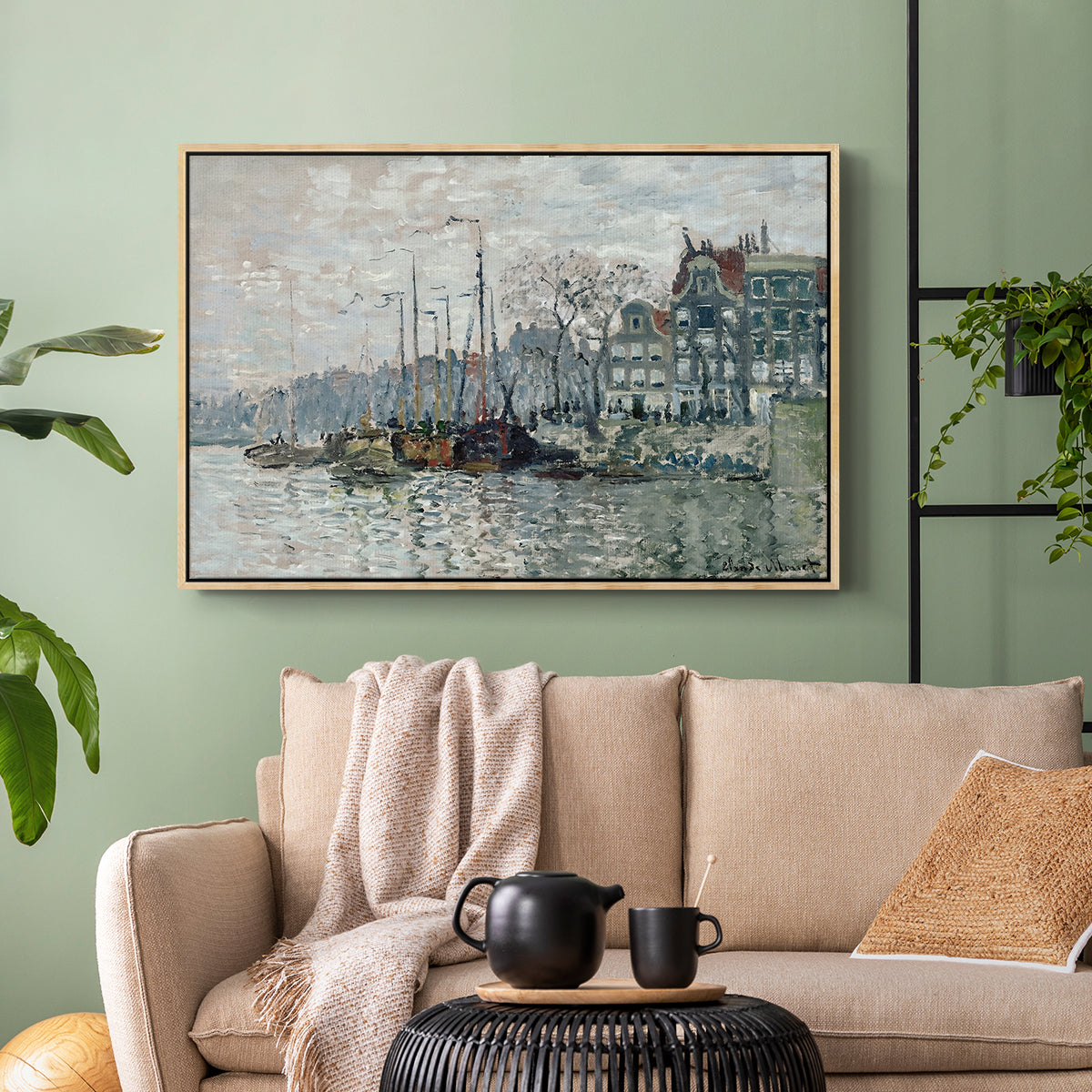 Natural wood floater framed canvas featuring a harbor view with masts, houses, and reflections in water, displayed above a sofa in a modern living room.