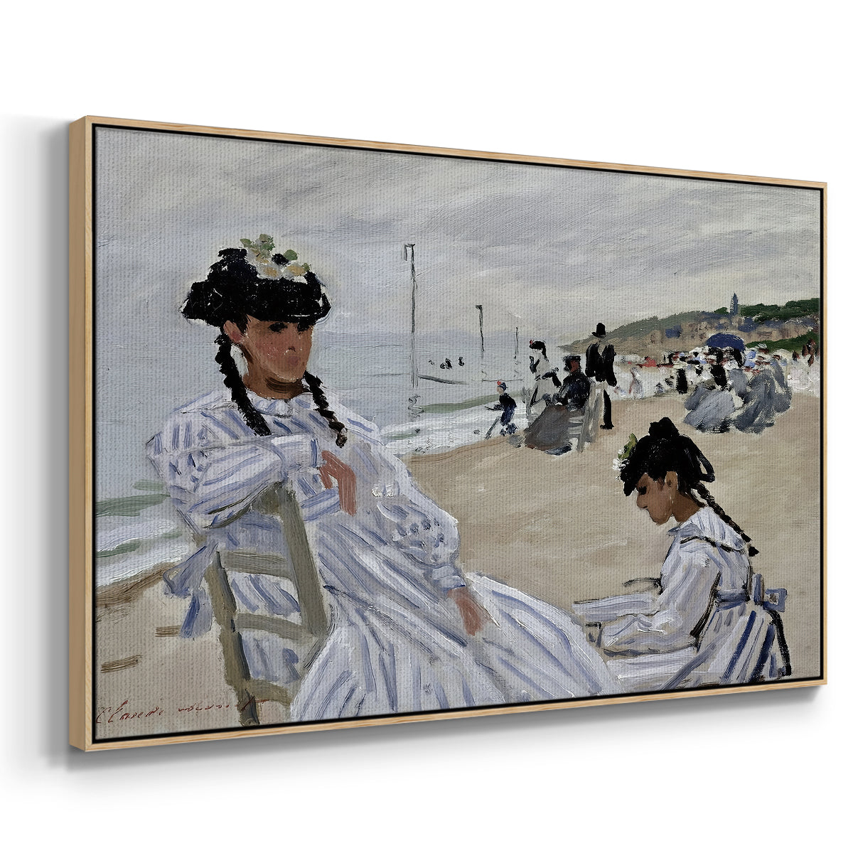 Angled view of On the Beach at Trouville, 1870 by Claude Monet in a natural wood floater framed canvas.