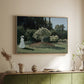 Natural wood floater framed canvas of Woman in the Garden, Sainte-Adresse, 1867 by Claude Monet, featuring an impressionist figure in sunlit garden with lush vegetation above a sideboard in a softly lit hallway.