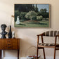 Woman in the Garden, Sainte-Adresse, 1867 by Claude Monet as a natural wood floater framed canvas featuring an elegant woman posed outdoors among blooming plants, styled above a mid-century console in a contemporary living area.