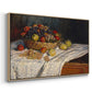 Angled view of Still Life with Apples and Grapes, 1880 by Claude Monet in a natural wood floater framed canvas.