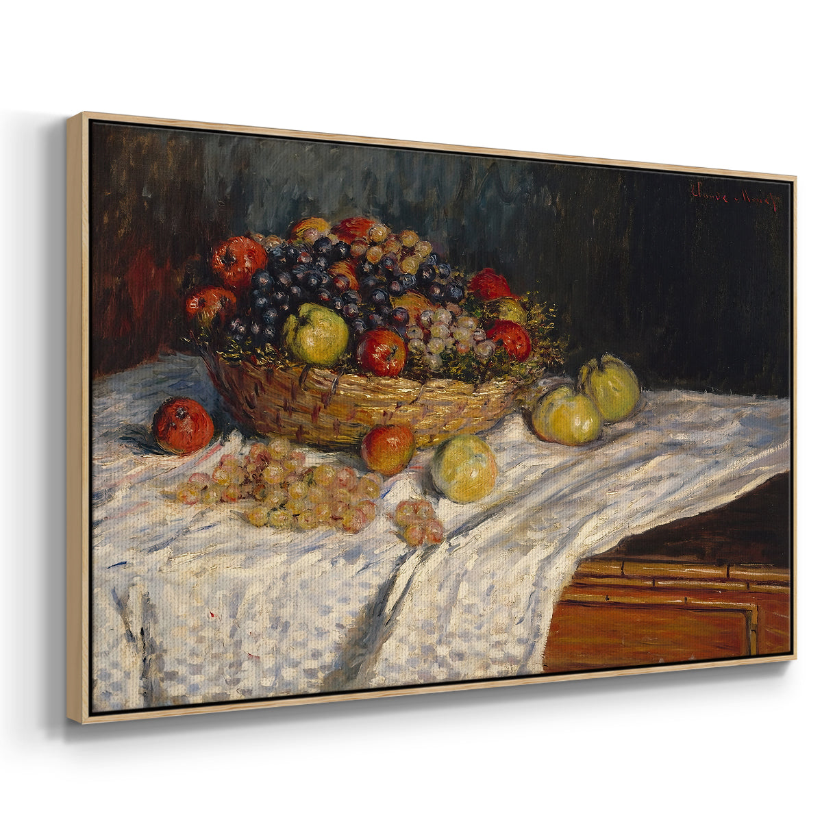Angled view of Still Life with Apples and Grapes, 1880 by Claude Monet in a natural wood floater framed canvas.