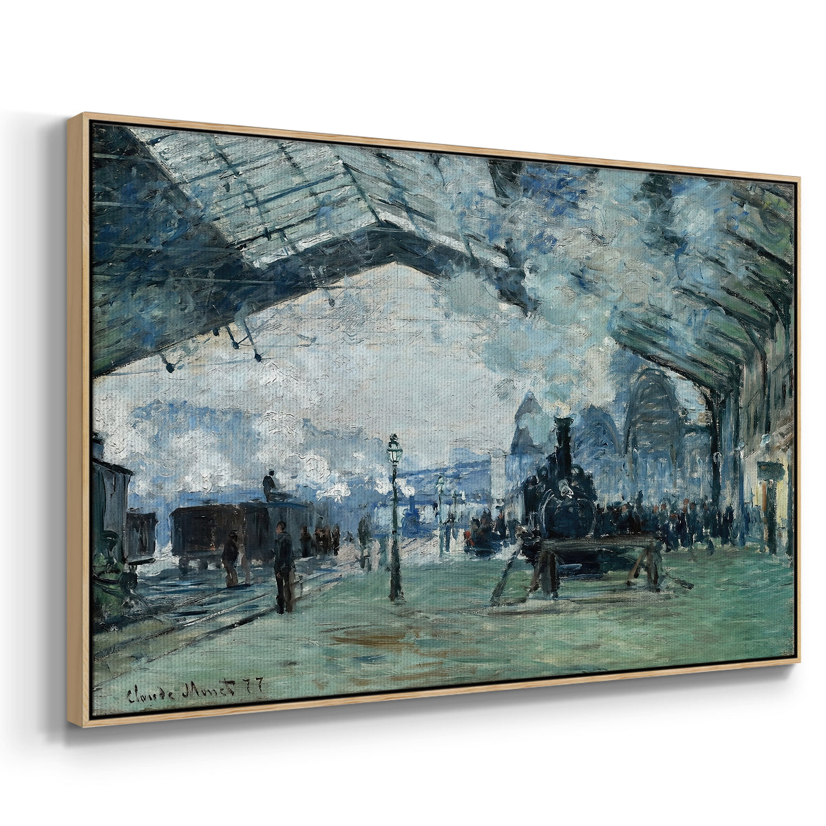 Angled view of The Saint-Lazare Station, 1877 by Claude Monet in a natural wood floater framed canvas.