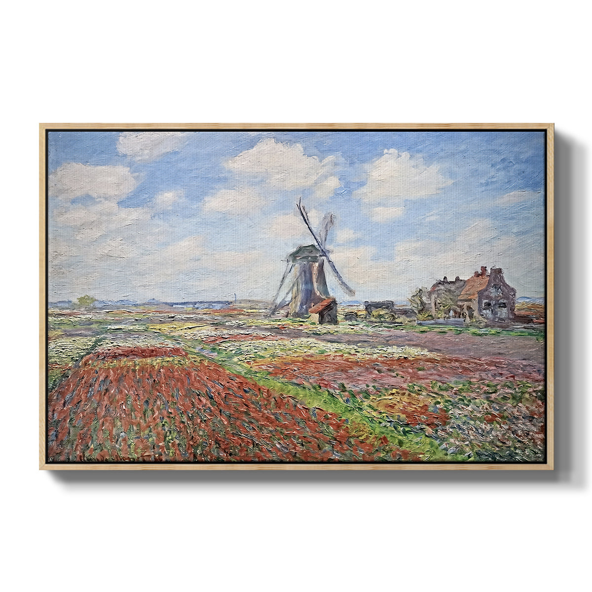 Tulip Fields with the Rijnsburg Windmill, 1886 by Claude Monet in a natural wood floater framed canvas wall art display.