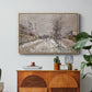The Boulevard de Pontoise at Argenteuil, Snow Effect, 1875 by Claude Monet in a natural wood floater framed canvas featuring a snow-covered street lined with trees and buildings under winter sky, displayed above a wood console cabinet.