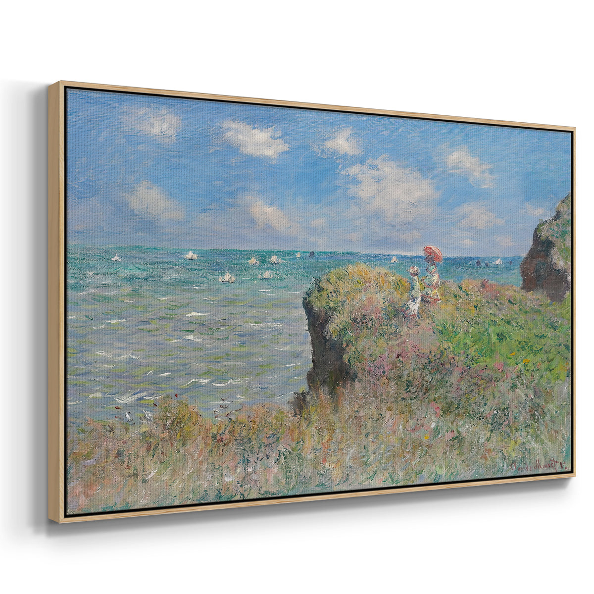 Angled view of The Cliff Walk at Pourville, 1882 by Claude Monet in a natural wood floater framed canvas.