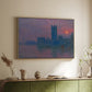 Natural wood floater framed canvas of The Houses of Parliament, Sunset, 1903 by Claude Monet, featuring an impressionist cityscape with warm sunset light over water above a sideboard in a softly lit hallway.