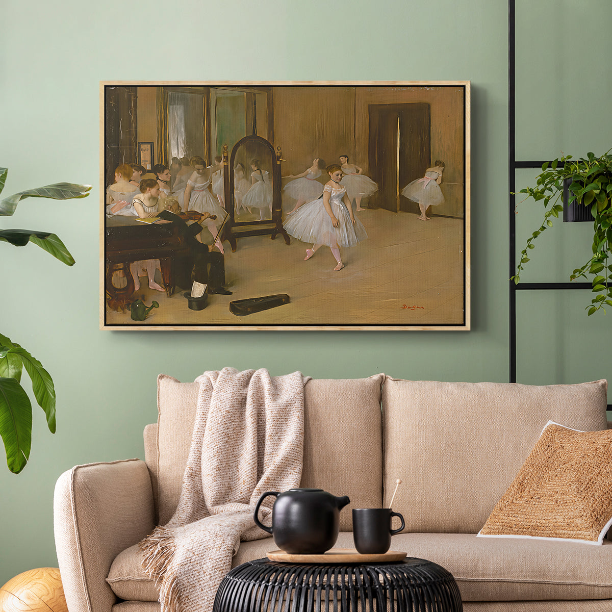 Natural wood floater framed canvas featuring a group of dancers mid-practice with teacher overseeing, displayed above a sofa in a modern living room.