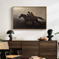 A Ride for Liberty – The Fugitive Slaves, c. 1862 by Eastman Johnson displayed in a natural wood floater framed canvas above a dark wood credenza in an entryway.