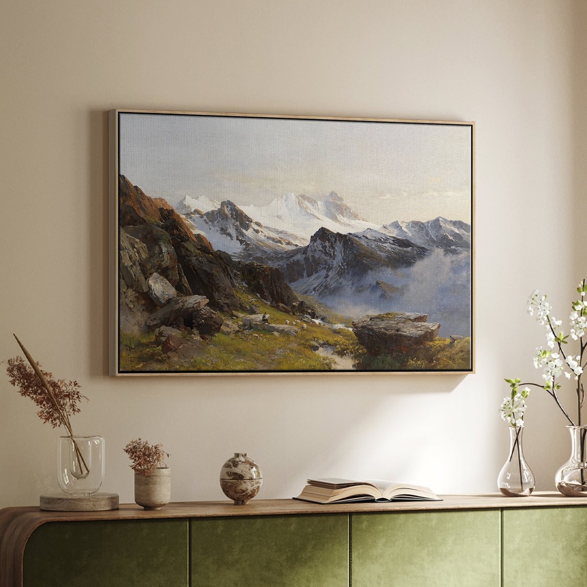 Natural wood floater framed canvas of The Großglockner from the Prager Hut, 1890 by Edward Theodore Compton, featuring a mountain summit seen from elevated viewpoint with surrounding landscape above a sideboard in a softly lit hallway.