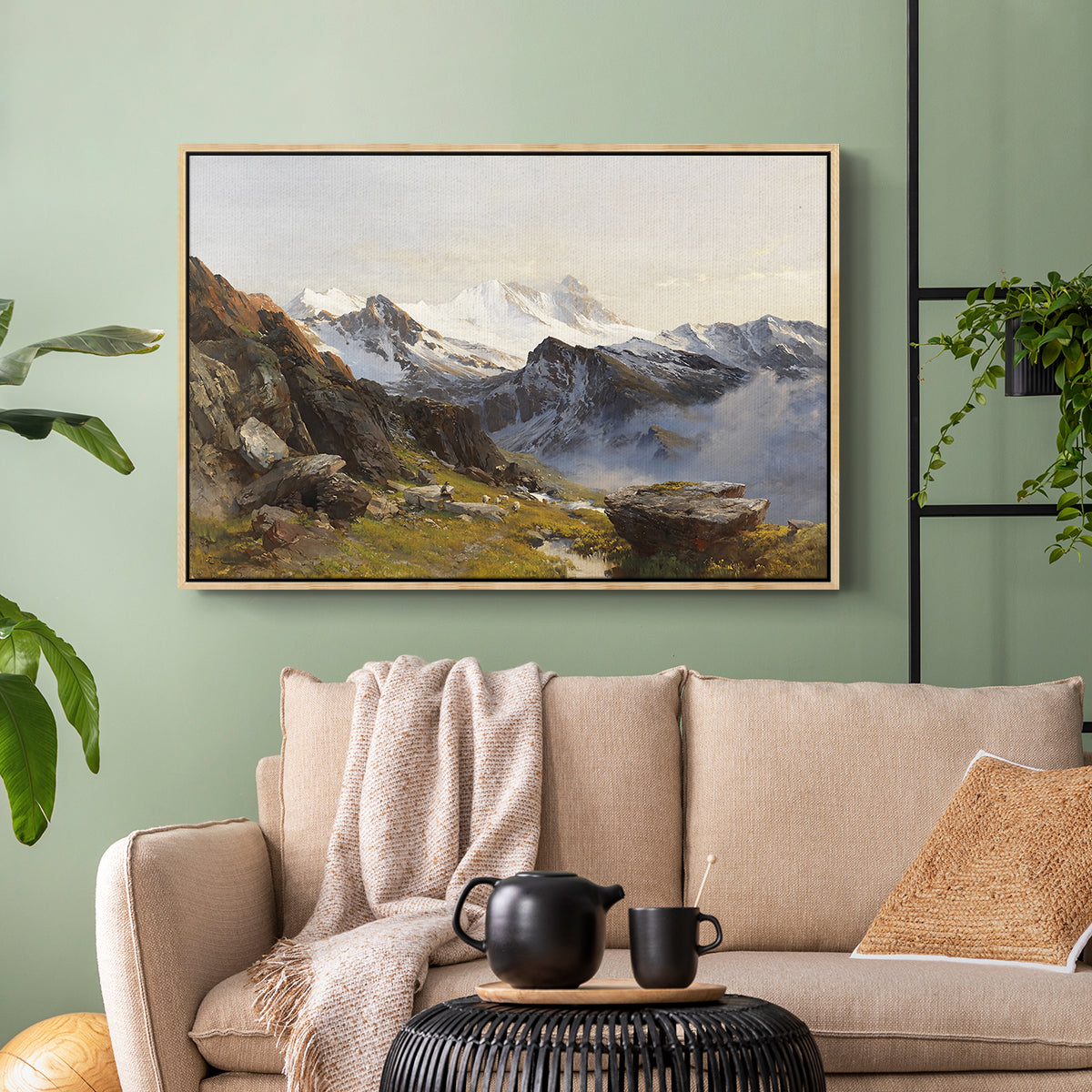 Natural wood floater framed canvas featuring a scenic mountain view with dramatic elevation and depth, displayed above a sofa in a modern living room.