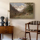 Landscape in the Caucasus, c. 1921 by Edward Theodore Compton as a natural wood floater framed canvas featuring a natural scene with valleys and rocky formations, styled above a mid-century console in a contemporary living area.
