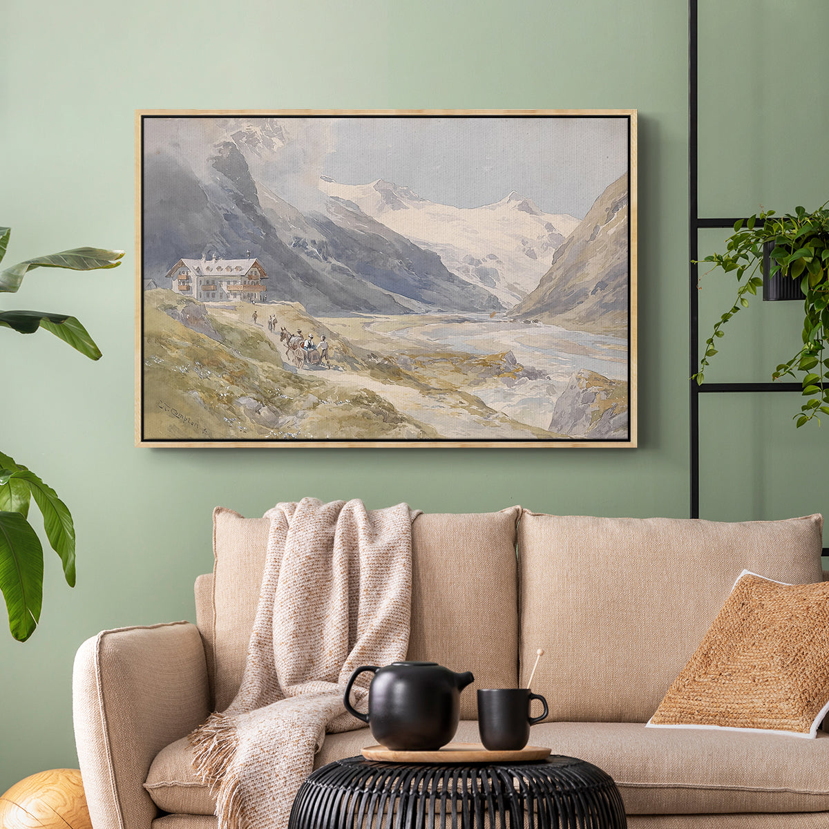 Natural wood floater framed canvas featuring a natural landscape with human presence among mountains, displayed above a sofa in a modern living room.