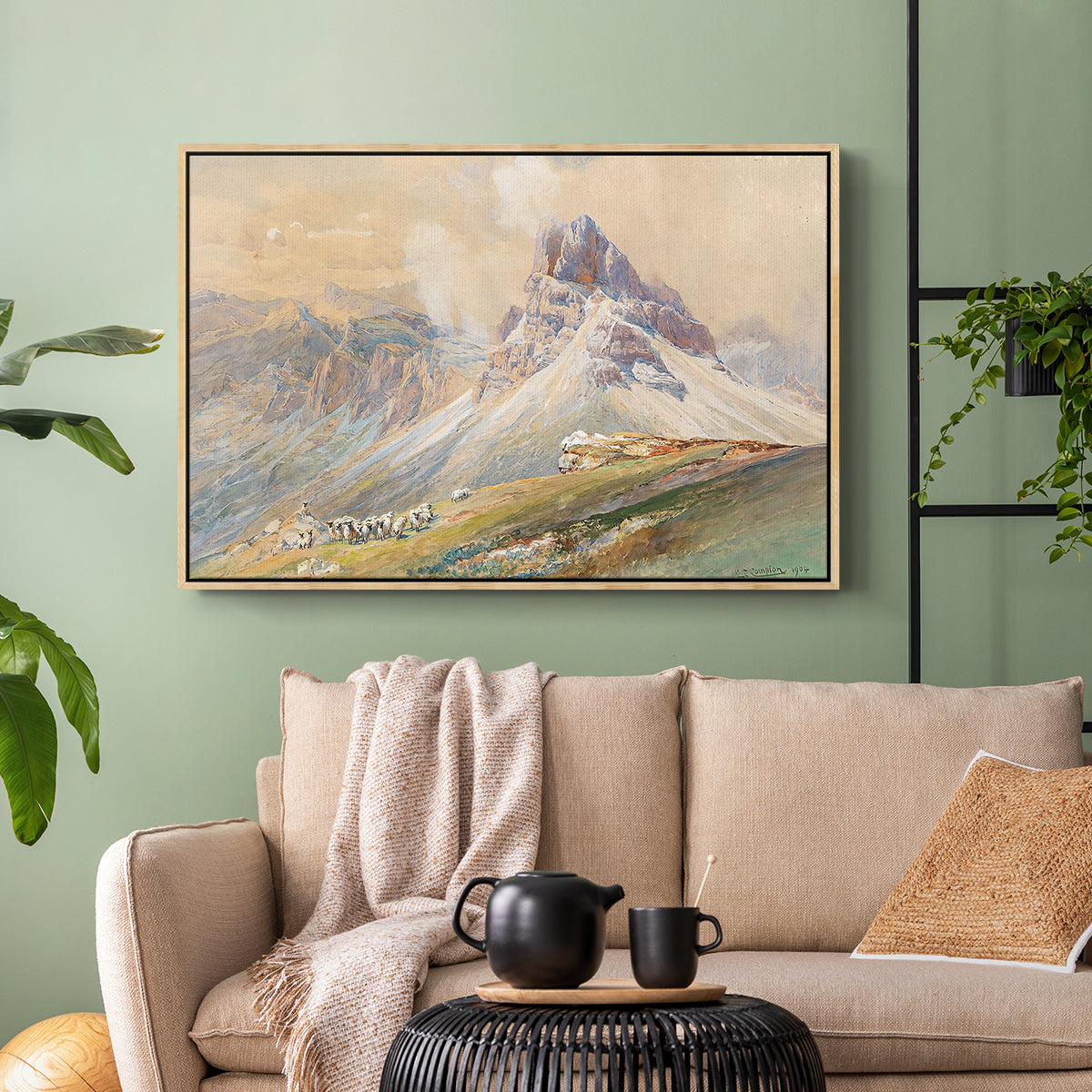 Natural wood floater framed canvas featuring a realistic mountain view with strong geological forms, displayed above a sofa in a modern living room.