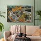 Natural wood floater framed canvas featuring an architectural scene with houses arranged in curved composition, displayed above a sofa in a modern living room.