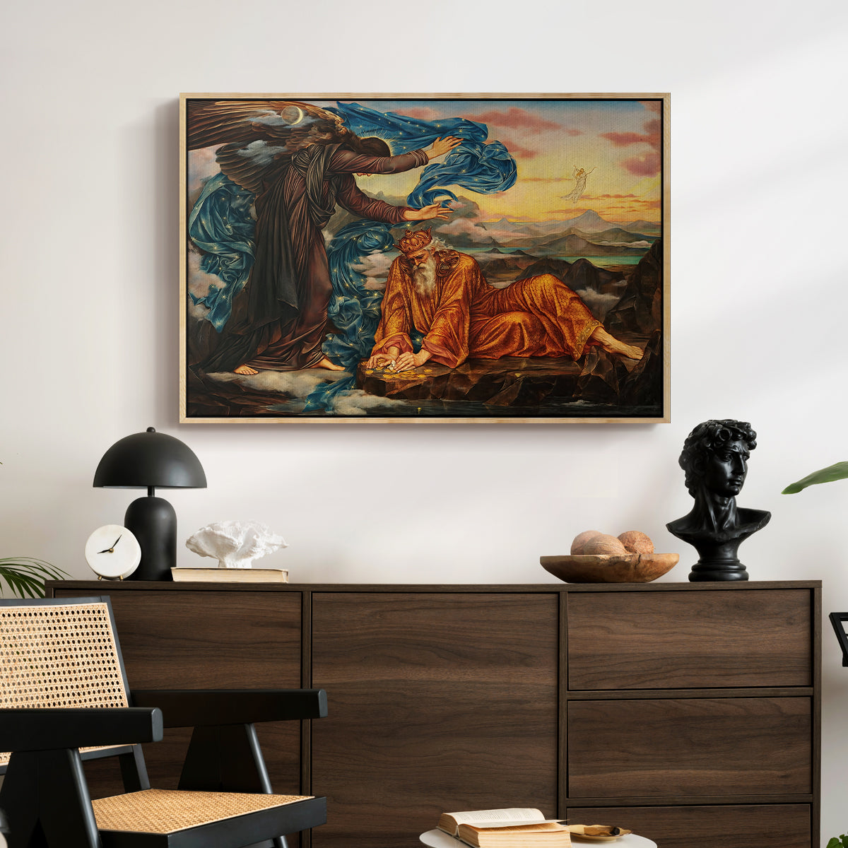 Earthbound, 1897 by Evelyn De Morgan displayed in a natural wood floater framed canvas above a dark wood credenza in an entryway.