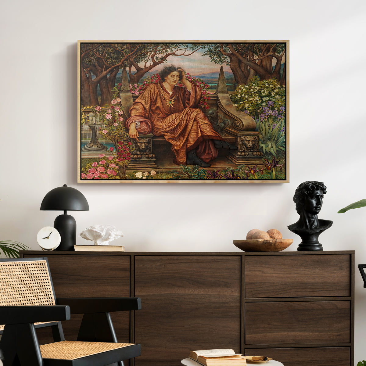 A Soul in Hell, c. 1901-1902 by Evelyn De Morgan displayed in a natural wood floater framed canvas above a dark wood credenza in an entryway.