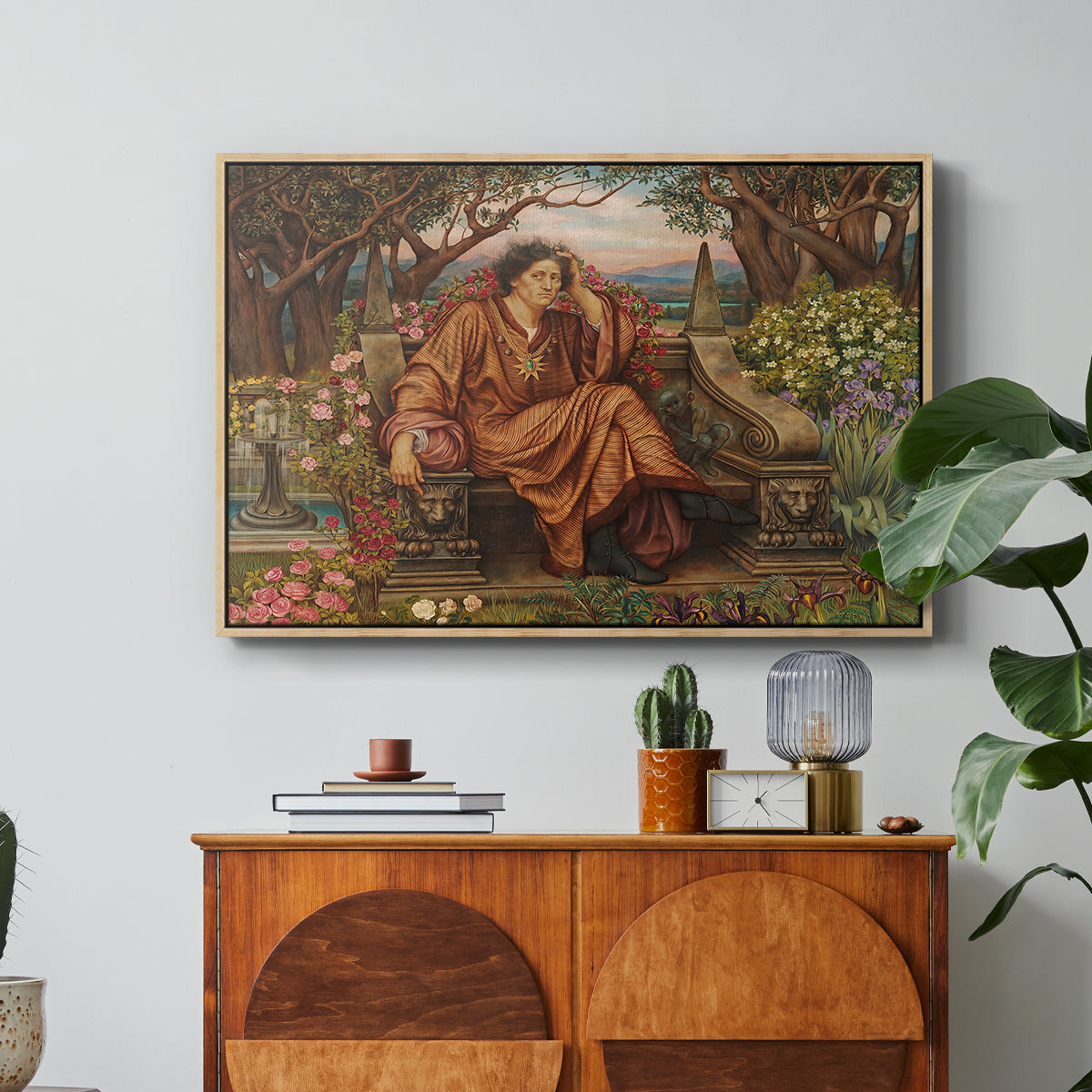 A Soul in Hell, c. 1901-1902 by Evelyn De Morgan in a natural wood floater framed canvas featuring a distressed figure surrounded by flames and torment in symbolic hell scene, displayed above a wood console cabinet.