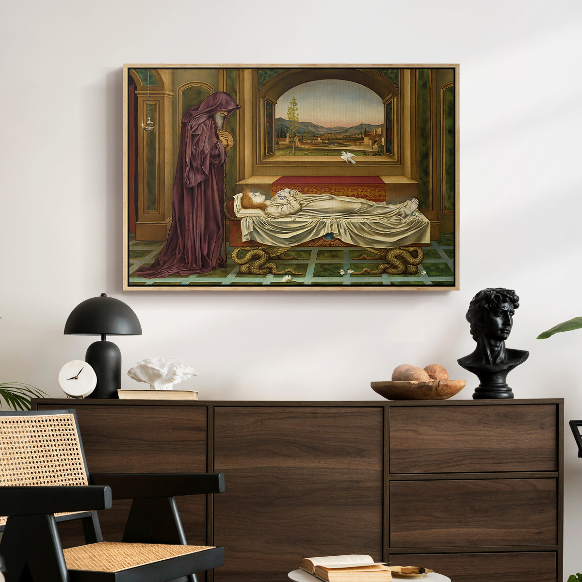 The Wandering Jew: Whom the Gods Love Die Young, 1888 by Evelyn De Morgan displayed in a natural wood floater framed canvas above a dark wood credenza in an entryway.