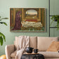 Natural wood floater framed canvas featuring a narrative composition with figure paused in reflective moment, displayed above a sofa in a modern living room.