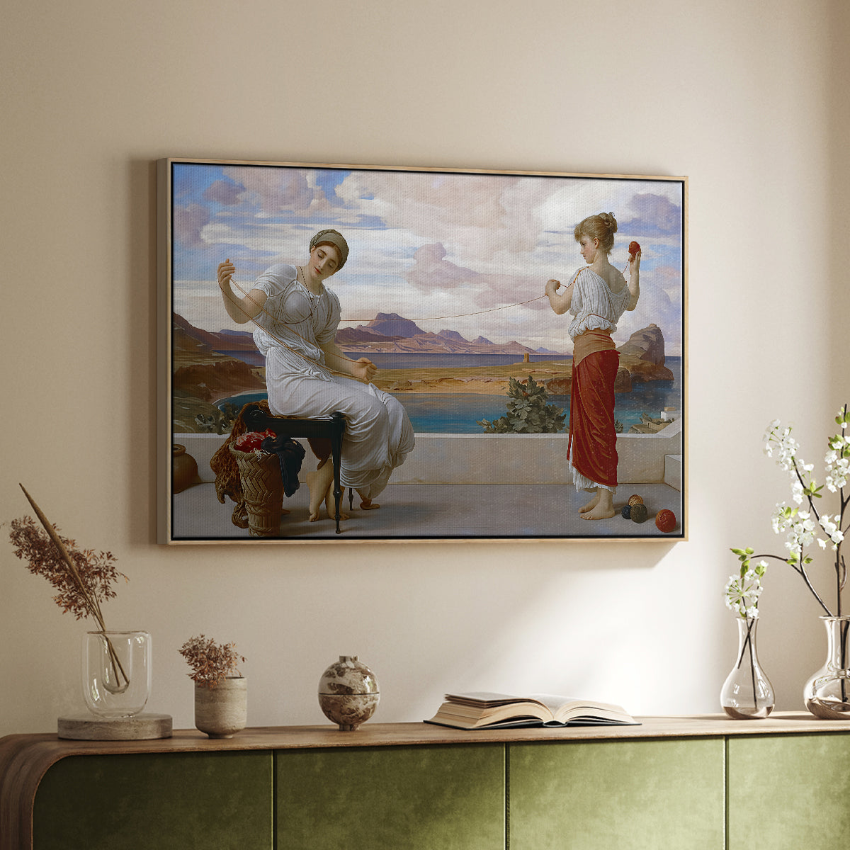 Natural wood floater framed canvas of Winding the Skein, c. 1878 by Frederic Leighton, featuring two women engaged in textile work with draped garments above a sideboard in a softly lit hallway.