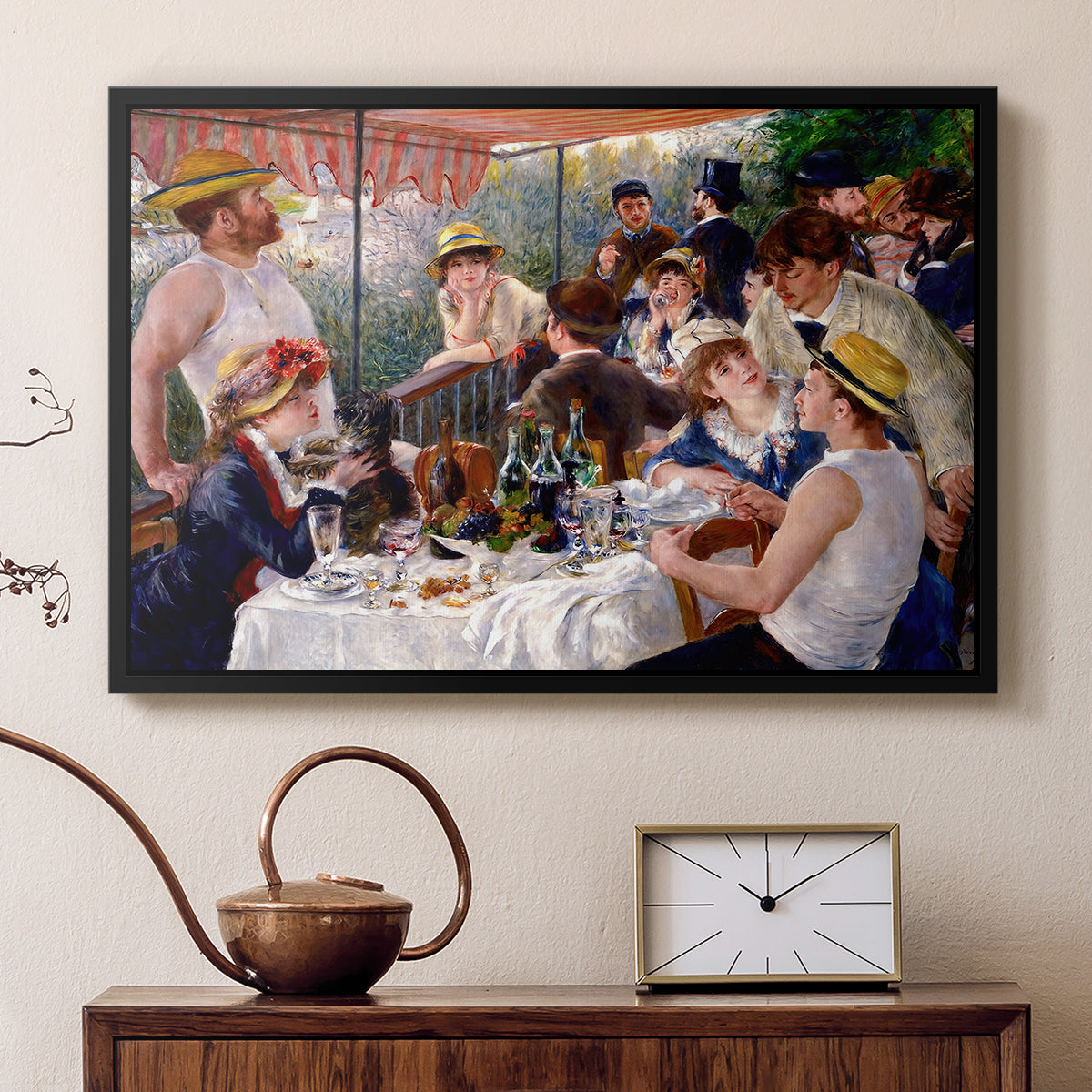 Black floater framed canvas featuring an impressionist scene of friends enjoying lunch with wine and conversation, displayed above a cabinet in a soft-toned living room.