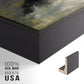Close-up of the black floater frame corner and gallery wrapped canvas construction.