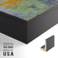 Close-up of the black floater frame corner and gallery wrapped canvas construction.