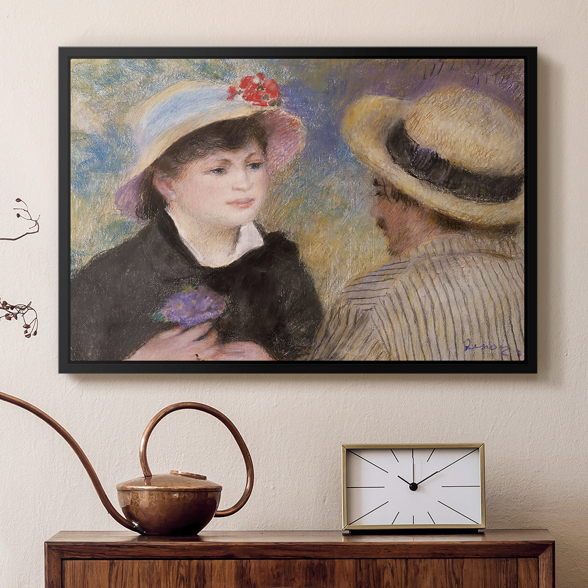 Black floater framed canvas featuring an impressionist depiction of couple enjoying leisure time near water, displayed above a cabinet in a soft-toned living room.