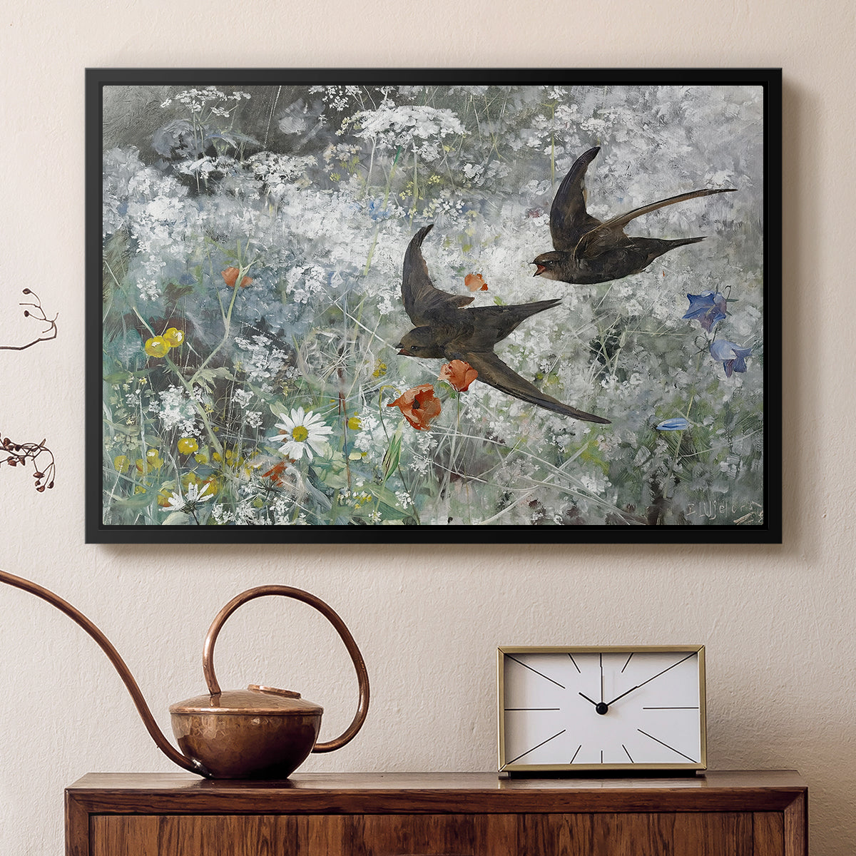 Black floater framed canvas featuring a multiple birds flying together in natural outdoor scene, displayed above a cabinet in a soft-toned living room.