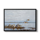 Greylag Geese (Grågäss), 1922 by Bruno Liljefors in a black floater framed canvas wall art display.