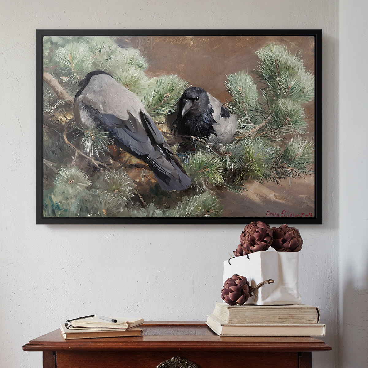 Black floater framed canvas featuring Hooded Crows (Kråkor), 1891 by Bruno Liljefors above an entryway table in a minimalist foyer.