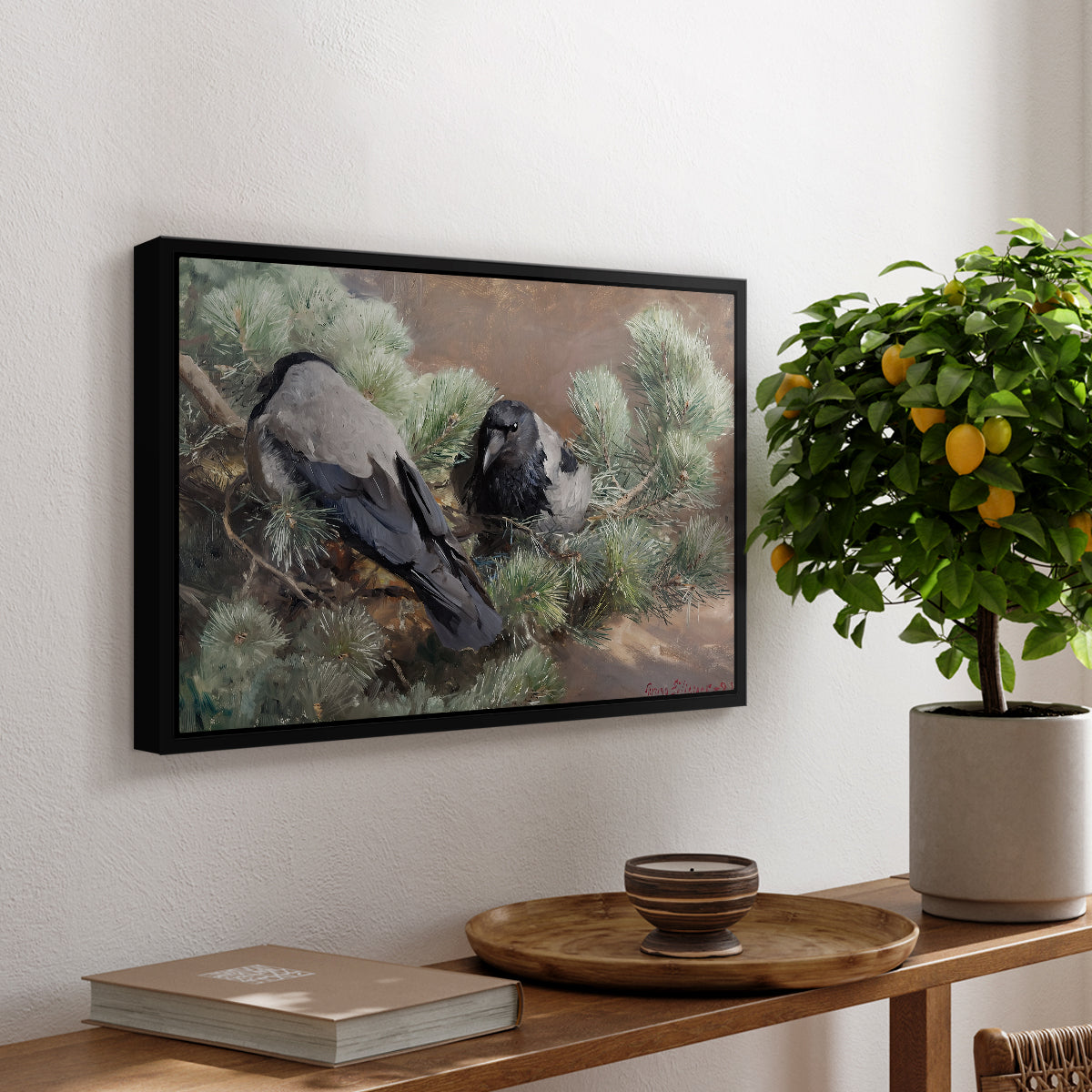 Hooded Crows (Kråkor), 1891 by Bruno Liljefors, presented in a black floater framed canvas featuring two crows perched on ground among grass and earth tones, displayed above a hallway console table.