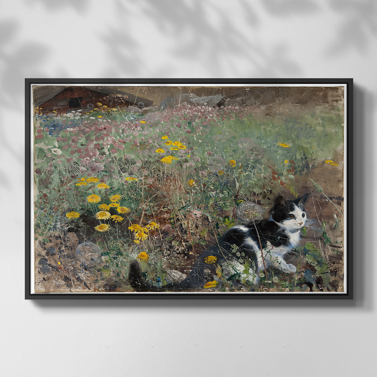 Front view of Cat on a Flowery Meadow, 1887 by Bruno Liljefors in a black floater framed canvas.